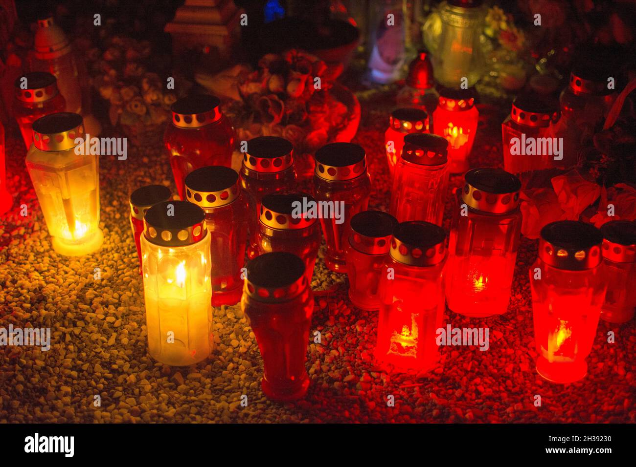 Candles at All Saint`s Day at night. Stock Photo
